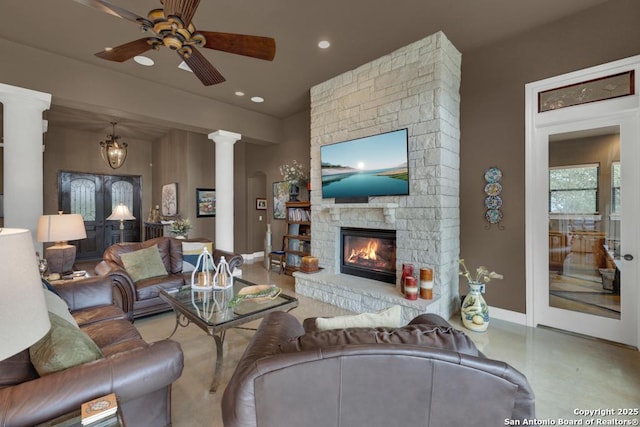 835 Shady Holw, New Braunfels, TX 78132 - living area featuring baseboards, ceiling fan, a fireplace, decorative columns, and recessed lighting