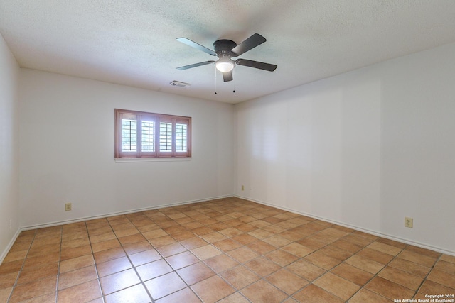 6355 Regency Wood, San Antonio, TX 78249 - unfurnished room with a ceiling fan, a textured ceiling, and baseboards