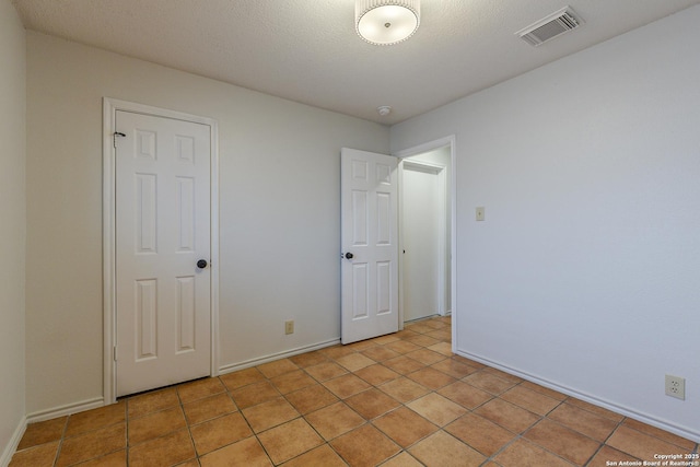 6355 Regency Wood, San Antonio, TX 78249 - unfurnished bedroom featuring baseboards