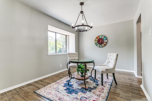 13603 Cobble Way, San Antonio, TX 78231 - dining area featuring a chandelier, wood finished floors, and baseboards