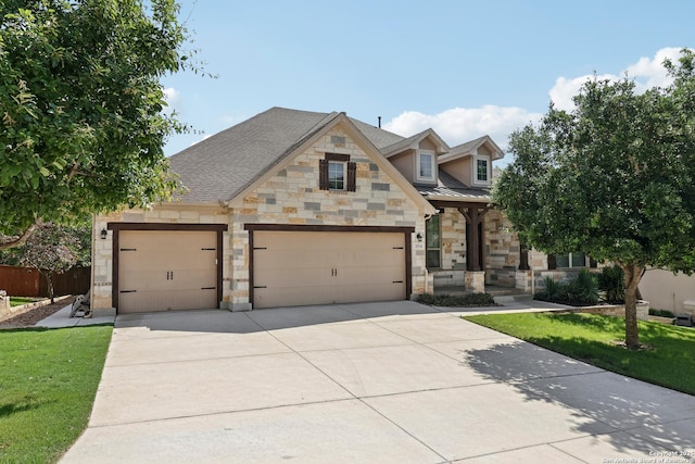 28534 Tristant Rdg, San Antonio, TX 78260 - view of front of home with stone siding, concrete driveway, a garage, metal roof, and a standing seam roof