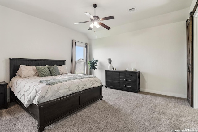 28534 Tristant Rdg, San Antonio, TX 78260 - bedroom with carpet flooring, baseboards, ceiling fan, and a barn door