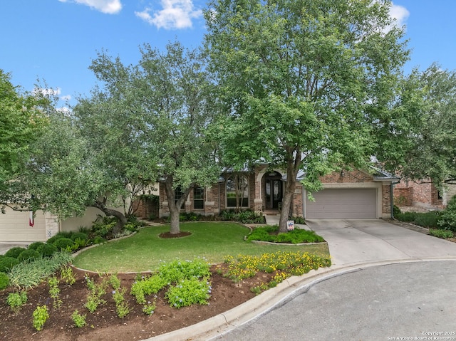 126 Calais Way, Shavano Park, TX 78249 - obstructed view of property featuring an attached garage, a front lawn, driveway, and brick siding