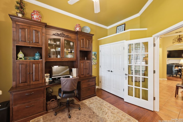 126 Calais Way, Shavano Park, TX 78249 - home office featuring crown molding, ceiling fan, arched walkways, built in study area, and baseboards