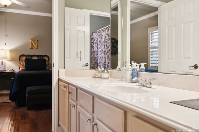 126 Calais Way, Shavano Park, TX 78249 - ensuite bathroom with ornamental molding, vanity, hardwood / wood-style flooring, and a ceiling fan