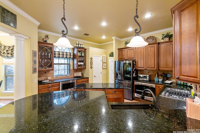 126 Calais Way, Shavano Park, TX 78249 - kitchen featuring appliances with stainless steel finishes, a sink, brown cabinets, backsplash, and ornamental molding