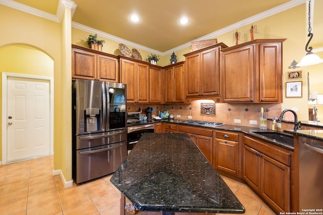 126 Calais Way, Shavano Park, TX 78249 - kitchen with stainless steel appliances, a sink, light tile patterned floors, brown cabinets, and ornamental molding