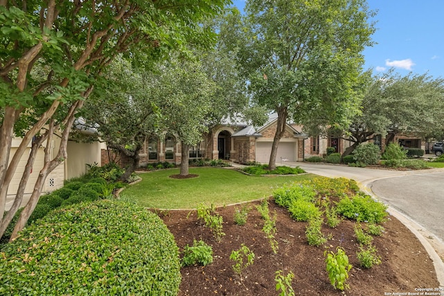 126 Calais Way, Shavano Park, TX 78249 - obstructed view of property with concrete driveway, a garage, and a front yard