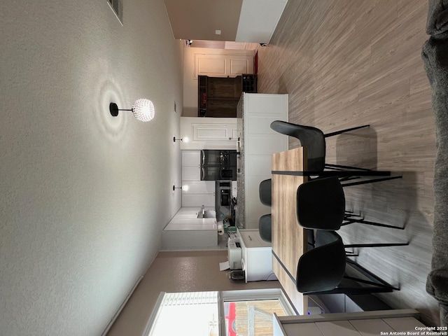 112 Agave Cir, Jourdanton, TX 78026 - interior space with a textured wall