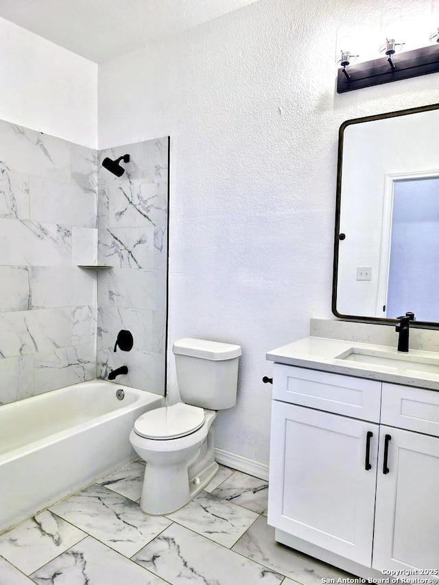 911 Florida, San Antonio, TX 78210 - full bath with toilet, marble look tile flooring, vanity, tub / shower combination, and baseboards