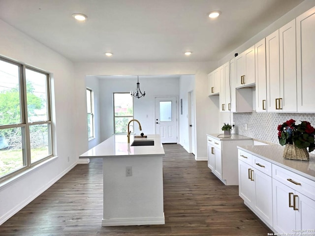 911 Florida, San Antonio, TX 78210 - kitchen featuring a sink, baseboards, a chandelier, tasteful backsplash, and recessed lighting