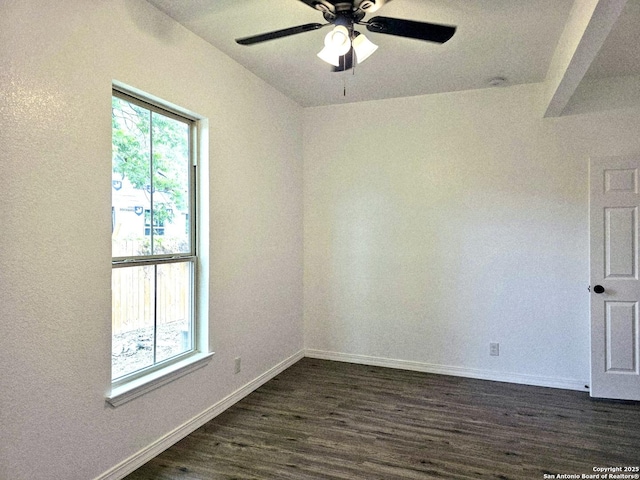 911 Florida, San Antonio, TX 78210 - empty room with dark wood-type flooring, ceiling fan, and baseboards