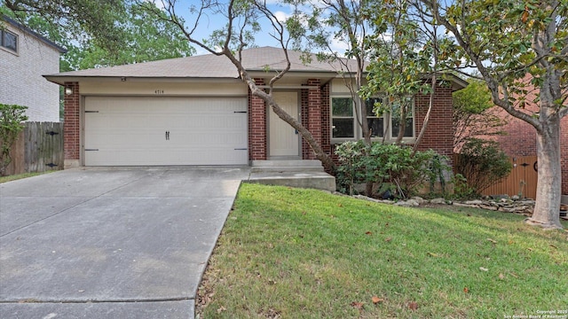 4714 Irish Elm, San Antonio, TX 78247 - ranch-style house with brick siding, concrete driveway, and a garage