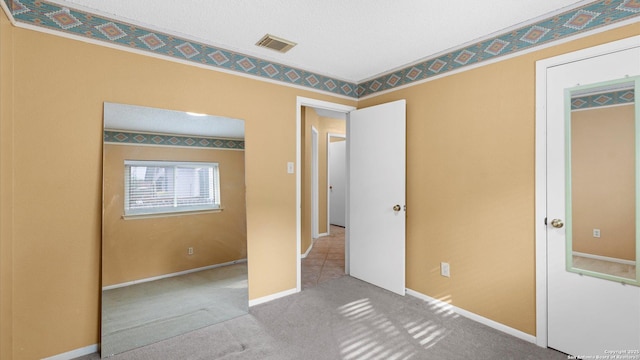 4714 Irish Elm, San Antonio, TX 78247 - unfurnished bedroom with carpet flooring, baseboards, and ornamental molding