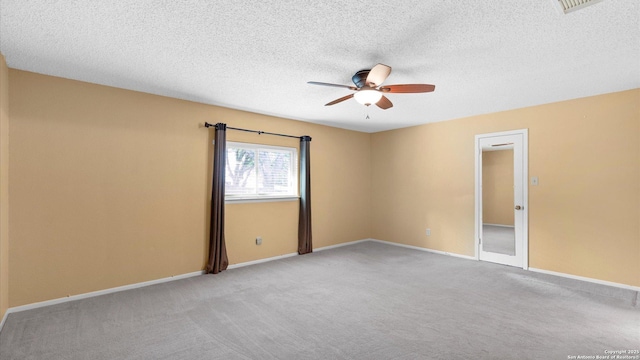 4714 Irish Elm, San Antonio, TX 78247 - carpeted spare room with ceiling fan, baseboards, and a textured ceiling