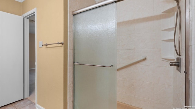 4714 Irish Elm, San Antonio, TX 78247 - bathroom with a stall shower and tile patterned floors