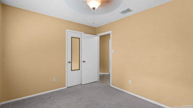 4714 Irish Elm, San Antonio, TX 78247 - carpeted empty room featuring baseboards and a ceiling fan