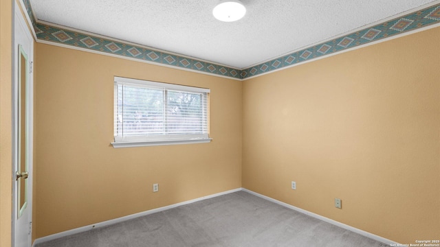 4714 Irish Elm, San Antonio, TX 78247 - carpeted empty room with a textured ceiling and baseboards