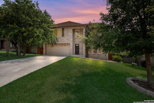 13314 Galicia, Universal City, TX 78148 - view of front of house featuring an attached garage, driveway, and brick siding