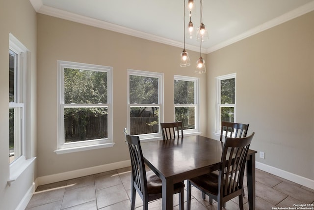 13314 Galicia, Universal City, TX 78148 - dining area with plenty of natural light, crown molding, light tile patterned floors, and baseboards