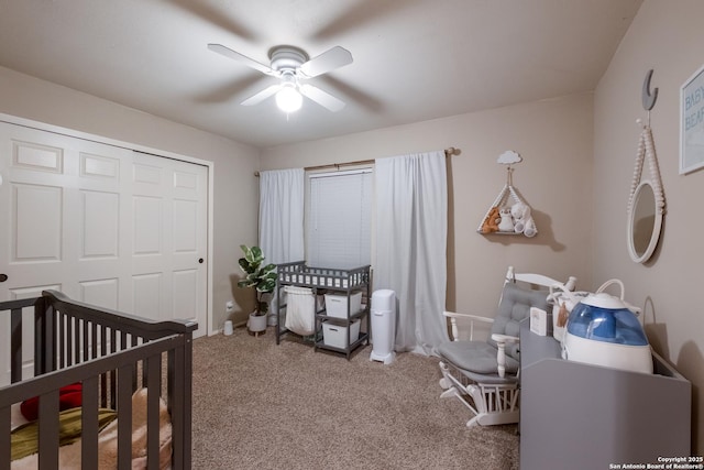 13314 Galicia, Universal City, TX 78148 - bedroom featuring a nursery area, carpet floors, ceiling fan, a closet, and baseboards