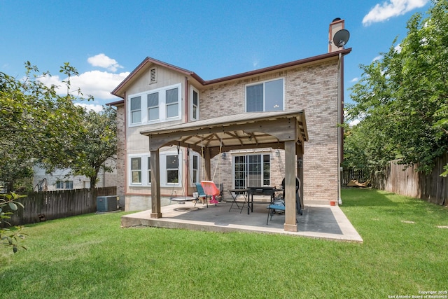 13314 Galicia, Universal City, TX 78148 - rear view of house featuring a gazebo, brick siding, central AC, and a patio