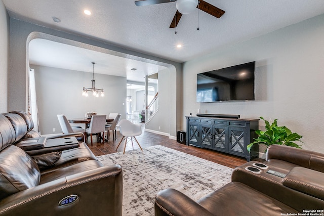 7719 Proton Smt, San Antonio, TX 78252 - living room with a chandelier, ceiling fan, dark wood-style floors, baseboards, and recessed lighting
