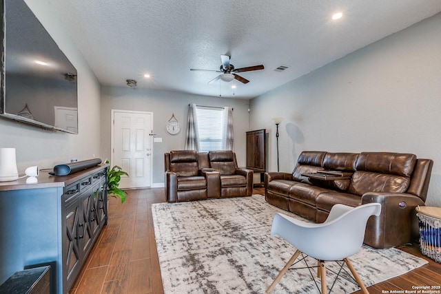 7719 Proton Smt, San Antonio, TX 78252 - living room with ceiling fan, dark wood-style flooring, a textured ceiling, recessed lighting, and baseboards