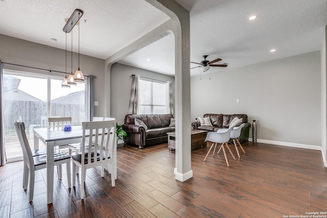 7719 Proton Smt, San Antonio, TX 78252 - dining room featuring a textured ceiling, dark wood-style floors, a ceiling fan, baseboards, and recessed lighting