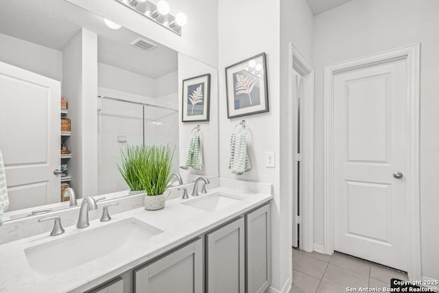 7526 Boxing Elm, San Antonio, TX 78244 - full bathroom featuring tile patterned flooring, a stall shower, and double vanity