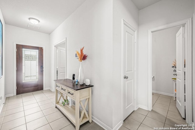 7526 Boxing Elm, San Antonio, TX 78244 - foyer featuring light tile patterned floors and baseboards