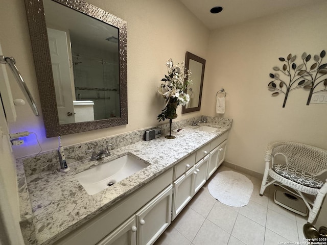 1839 Shoal Run, San Antonio, TX 78232 - full bath featuring a stall shower, double vanity, tile patterned floors, and baseboards