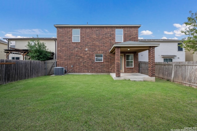 6015 Wisteria Hl, San Antonio, TX 78218 - back of property featuring brick siding, a patio, and central air condition unit