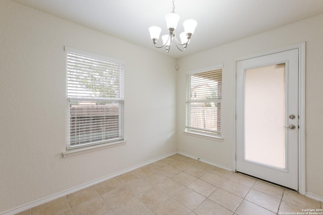 6015 Wisteria Hl, San Antonio, TX 78218 - empty room with a chandelier and baseboards