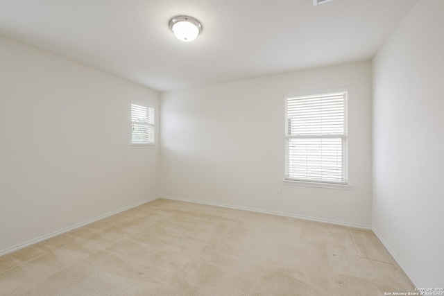6015 Wisteria Hl, San Antonio, TX 78218 - unfurnished room with light colored carpet and baseboards