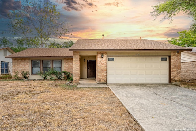 6718 Country Fld, San Antonio, TX 78240 - ranch-style home with brick siding, a garage, driveway, and roof with shingles