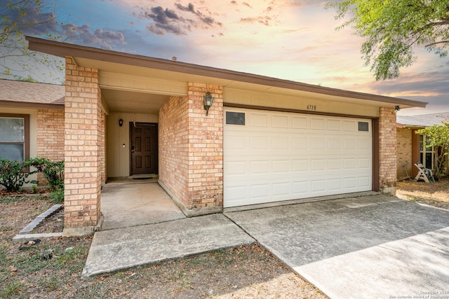 6718 Country Fld, San Antonio, TX 78240 - view of front of home with brick siding and driveway