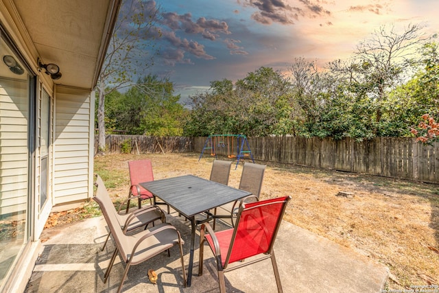 6718 Country Fld, San Antonio, TX 78240 - fenced backyard with a playground, outdoor dining space, and a patio area