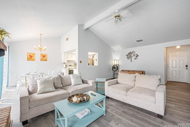 6718 Country Fld, San Antonio, TX 78240 - living area with a chandelier, wood finished floors, a ceiling fan, and baseboards