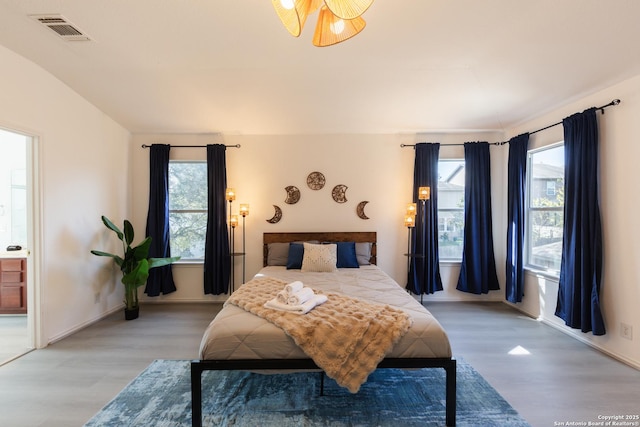 10819 Indigo, San Antonio, TX 78239 - bedroom featuring light wood-style flooring, multiple windows, and baseboards