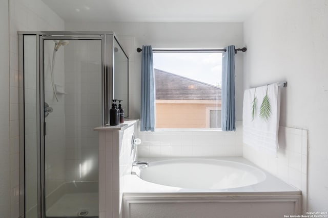 10819 Indigo, San Antonio, TX 78239 - full bathroom featuring a shower stall and a bath