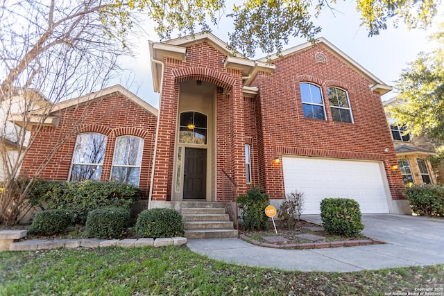 11610 Lemonmint, San Antonio, TX 78245 - view of front facade with brick siding, an attached garage, and concrete driveway