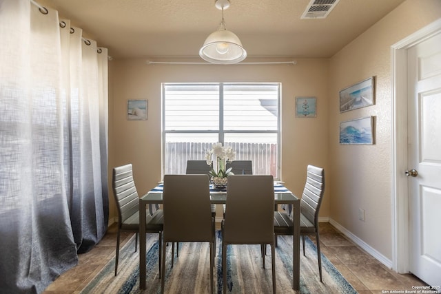 11610 Lemonmint, San Antonio, TX 78245 - tiled dining room with baseboards