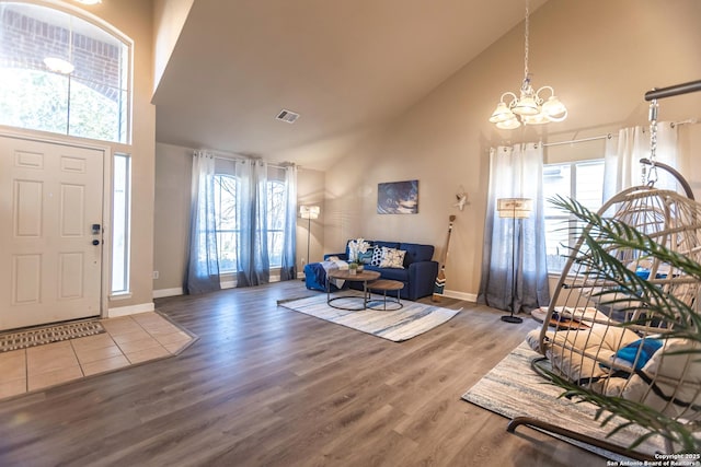 11610 Lemonmint, San Antonio, TX 78245 - entrance foyer featuring high vaulted ceiling, a chandelier, wood finished floors, and baseboards