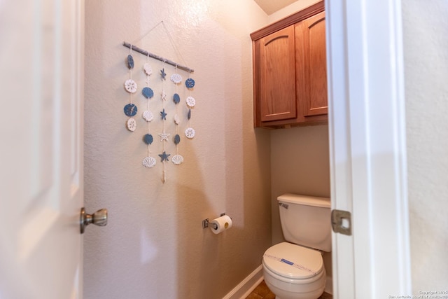 11610 Lemonmint, San Antonio, TX 78245 - bathroom with toilet and baseboards