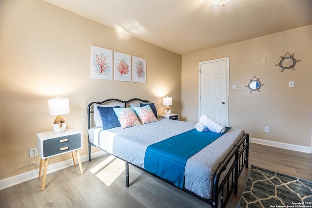 11610 Lemonmint, San Antonio, TX 78245 - bedroom with wood finished floors and baseboards