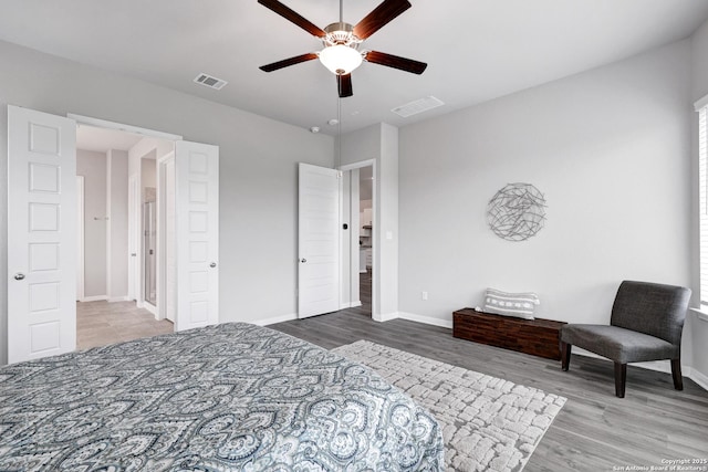 513 Foxbrook, Cibolo, TX 78108 - bedroom with wood finished floors, baseboards, and ceiling fan