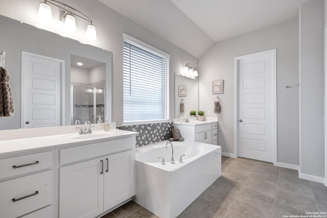 513 Foxbrook, Cibolo, TX 78108 - full bathroom with a stall shower, two vanities, a garden tub, and baseboards