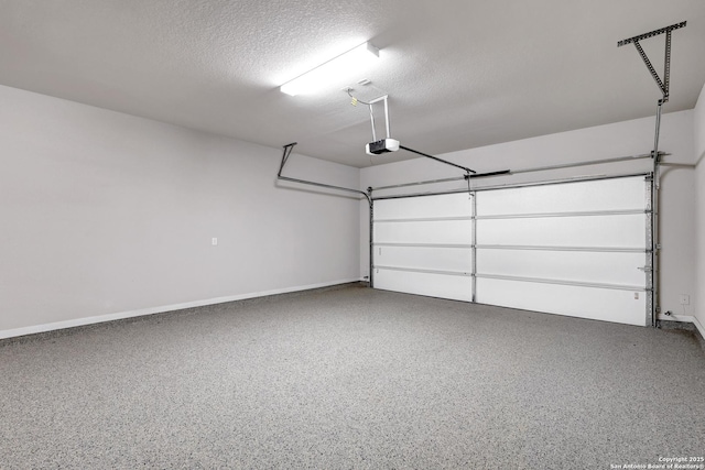 513 Foxbrook, Cibolo, TX 78108 - garage featuring a garage door opener and baseboards