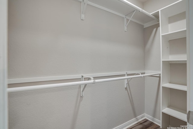 2411 W Huisache Ave, San Antonio, TX 78228 - spacious closet with wood finished floors